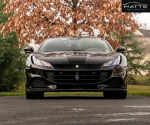 view of a dark sports car post-paint correction